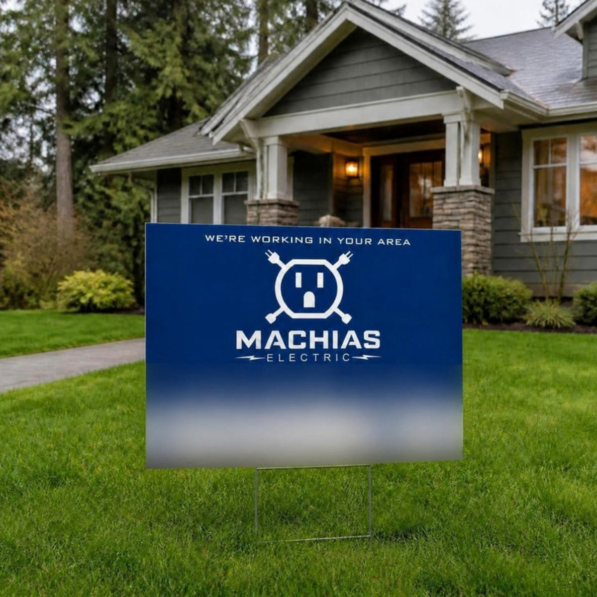 Client example: electrician yard sign on a front lawn