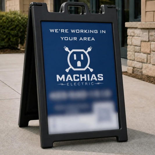 Client example: black plastic A-frame sidewalk sign with electrician insert