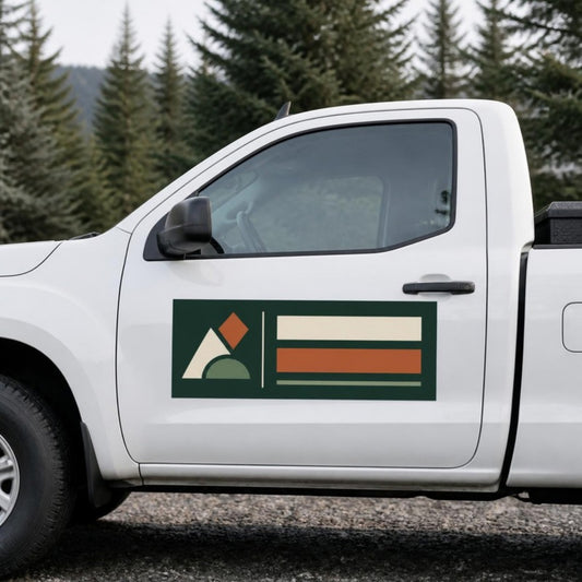 Custom vehicle door magnet on a white work truck